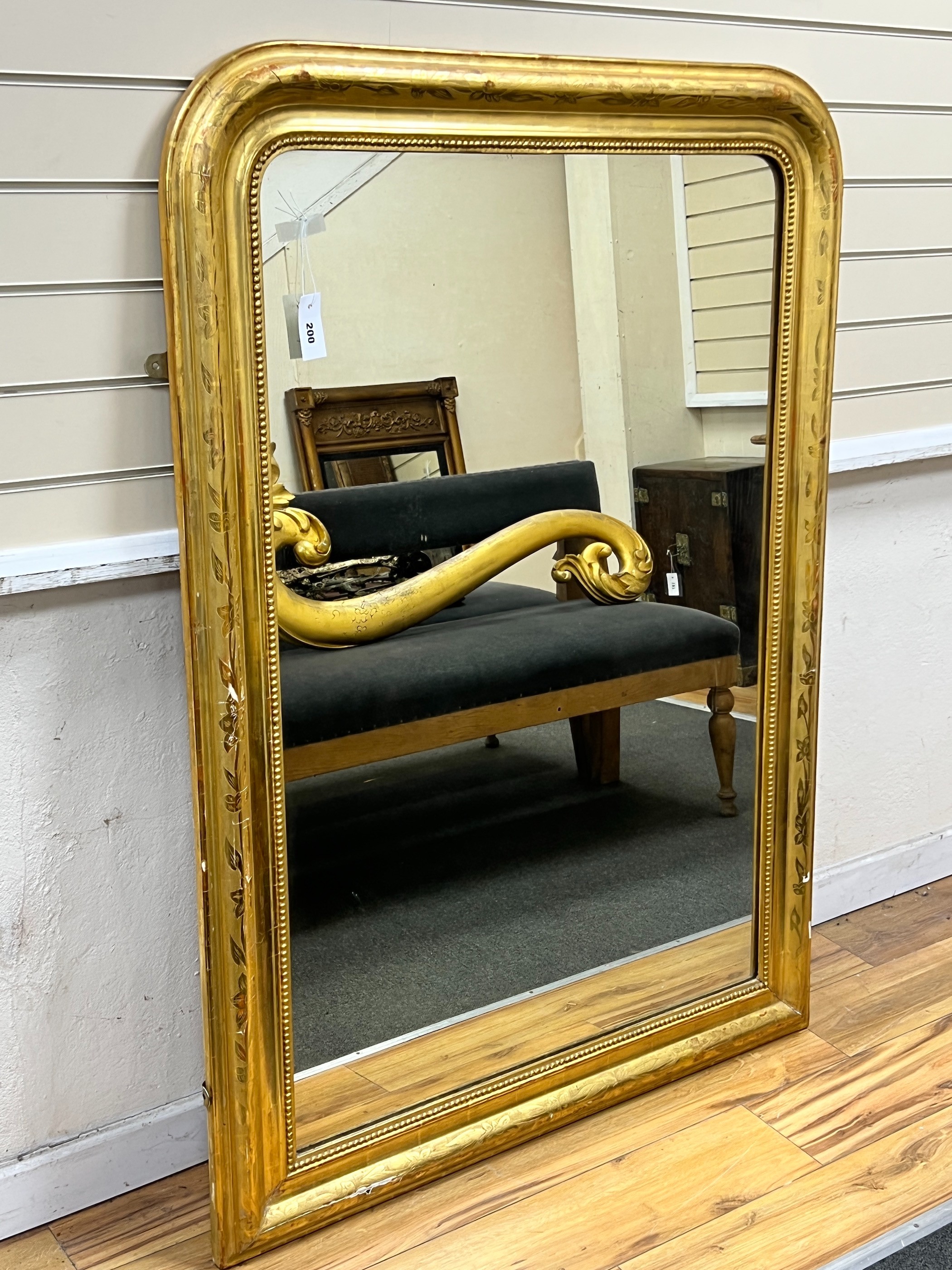 A 19th century French giltwood overmantel mirror, width 100cm, height 141cm